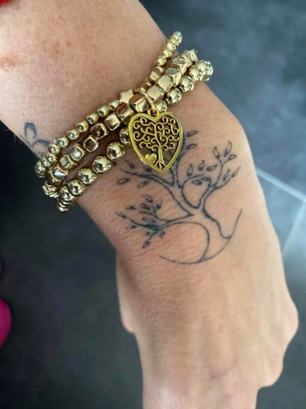 Bracelet perles couleur or avec arbre de vie