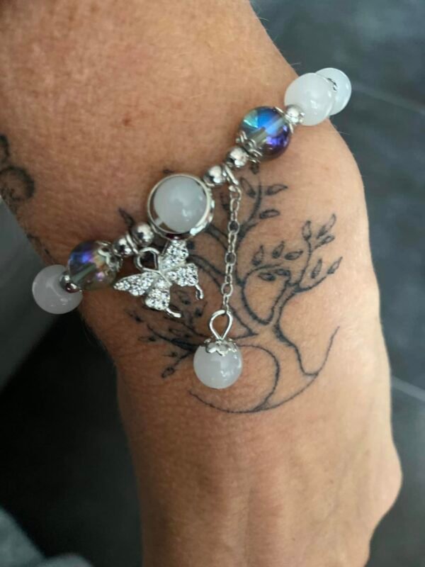 Bracelet perles et papillon